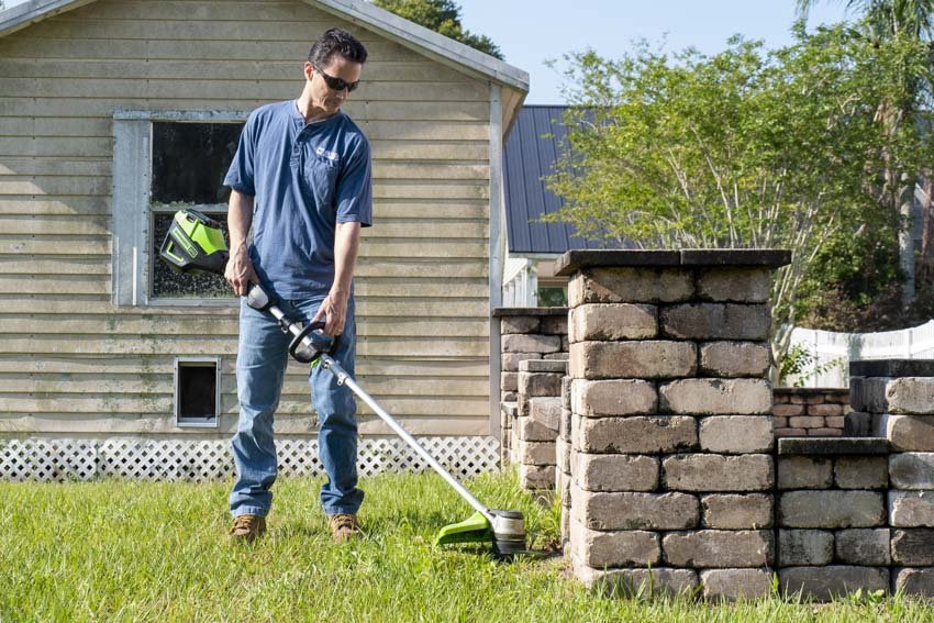 Greenworks 12-Inch 40V Cordless Chainsaw, Battery Not Included 20292 with 12-Inch 24V Cordless String Trimmer, 2.0 AH Battery Included 21342